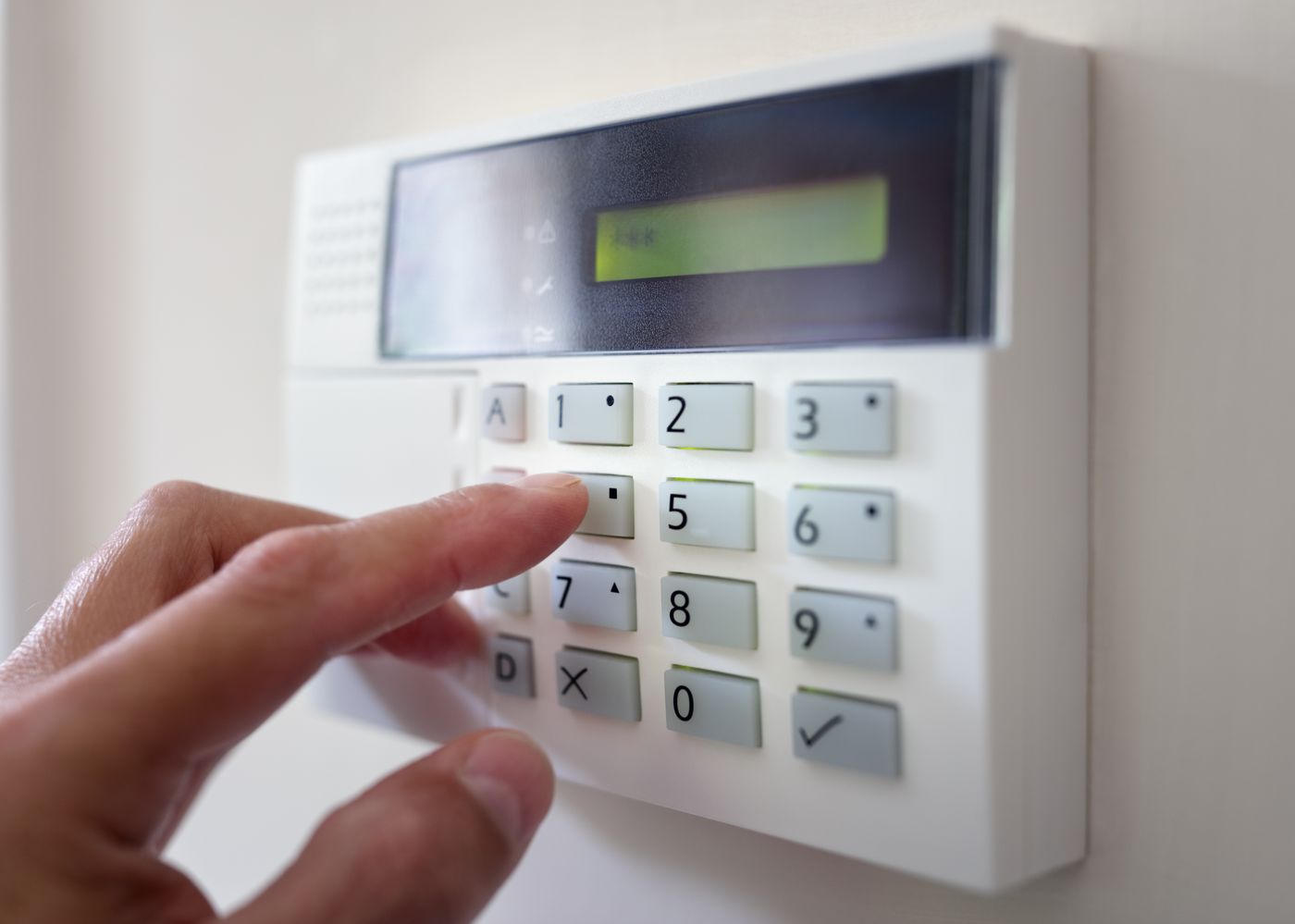 Technician writing a security system contract